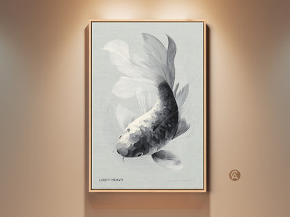 Framed canvas art featuring a black and white koi fish. The artwork is displayed on a wall. It has a clean modern look. The frame is a natural wood color. This piece would be perfect for adding a touch of zen to any room.