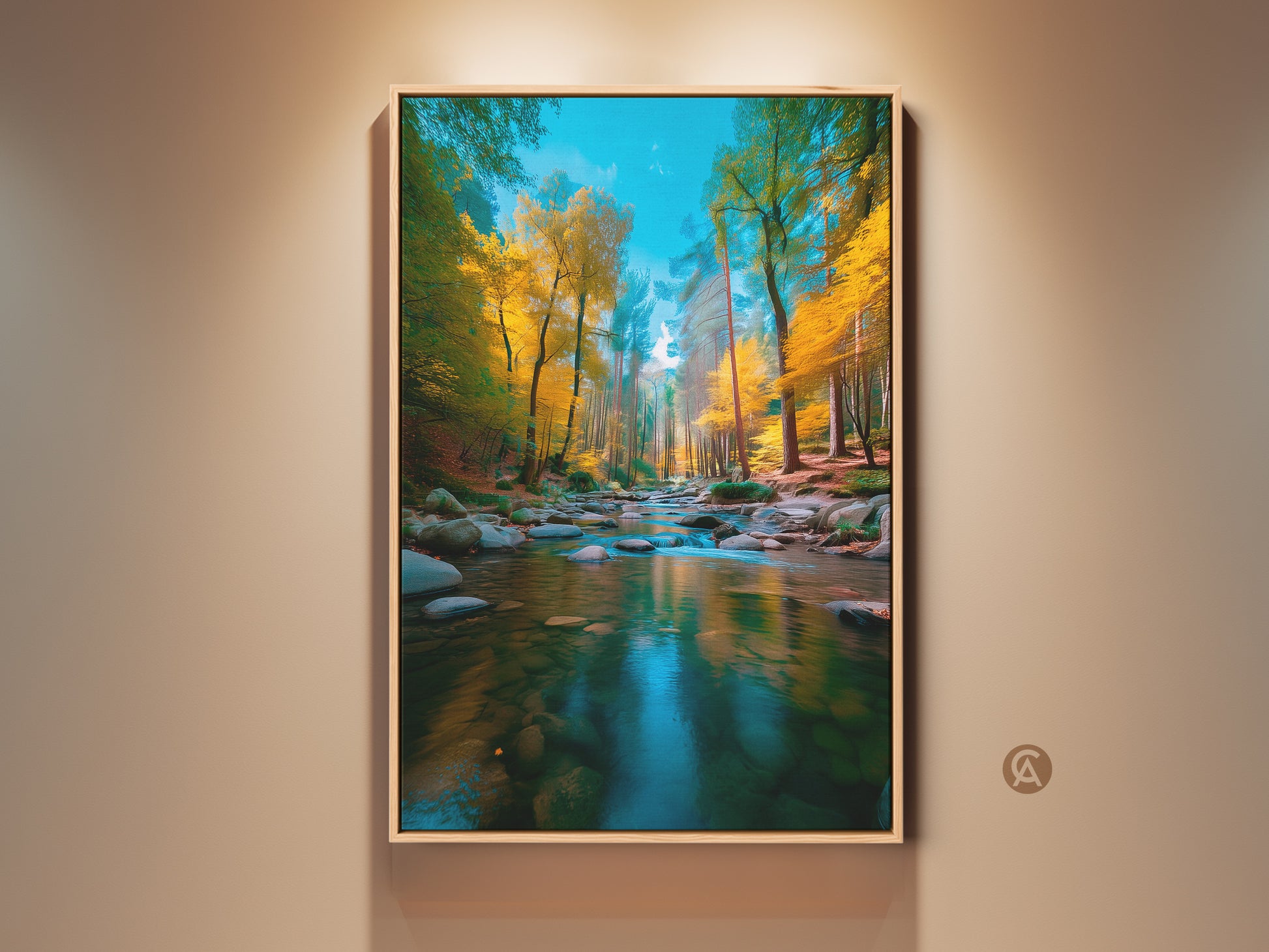 Framed landscape artwork showcasing a river flowing through an autumn forest. Trees with vibrant yellow leaves line the riverbank. The artwork is displayed on a neutral wall for home decor inspiration.