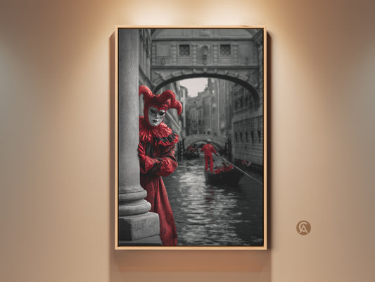 Capture the Venice Carnival spirit with this canvas art print. It shows a theatrical jester in a red costume peeking behind a pillar. See the gondola and Venetian architecture. This artwork adds eclectic charm to any room. A perfect travel to Venice gift.