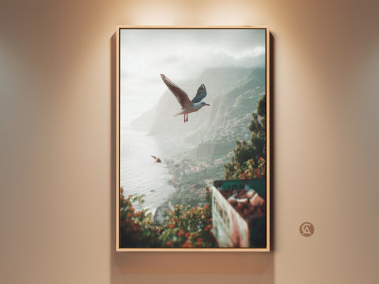Teal green grey coastal art print showcasing seagulls flying over a seaside town. This beach landscape wall decor brings a tranquil ocean view to your living space. A perfect travel gift for him or any sea lover looking to add coastal vibes to their home decor.