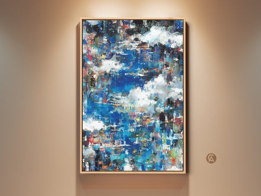 Abstract artwork with blue and white hues. The painting is displayed in a light wood frame. Modern art piece perfect for adding a touch of color to any room. Shop now to elevate your home decor with this unique canvas art.
