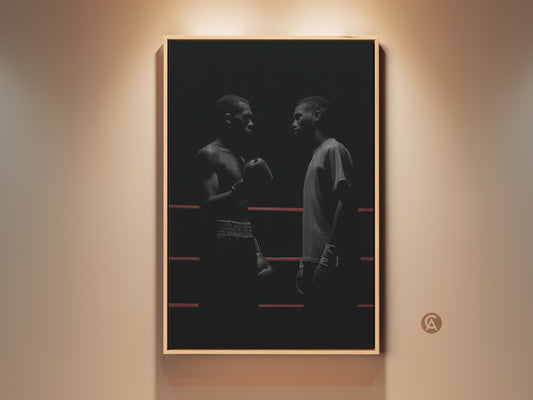 Motivational black and white boxing canvas art in a frame. Two boxers face off in a boxing ring. This minimalist boxer artwork is ideal for industrial loft decor. A unique sports enthusiast wall decor for a home gym or office workspace. A striking piece of athlete motivation art.