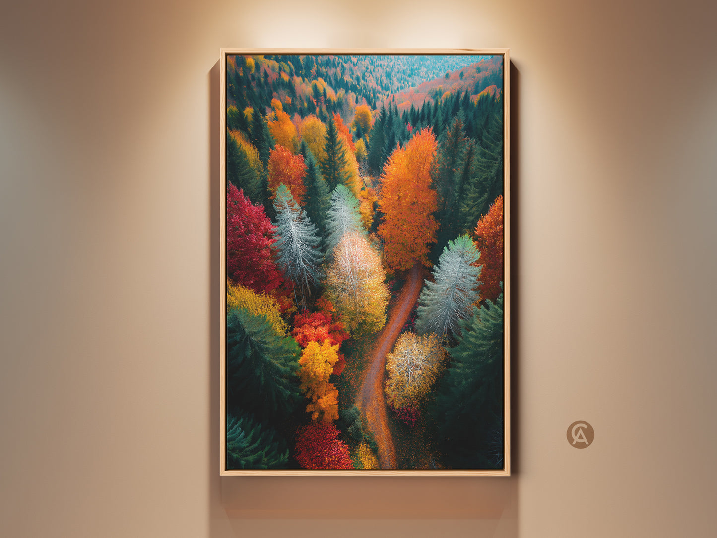 Framed forest art print. This fall landscape artwork features a colorful aerial view of trees. The fine art print is displayed in a wood frame. Perfect wall decor to bring nature indoors.