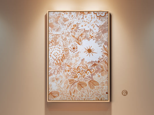 Vintage floral art print on a wall. This botanical artwork features orange and white hues. Its lace-inspired texture adds a Boho touch to home decor. This floral wall hanging is perfect for plant lovers seeking aesthetic wall art decor. The flower art provides feminine home styling.