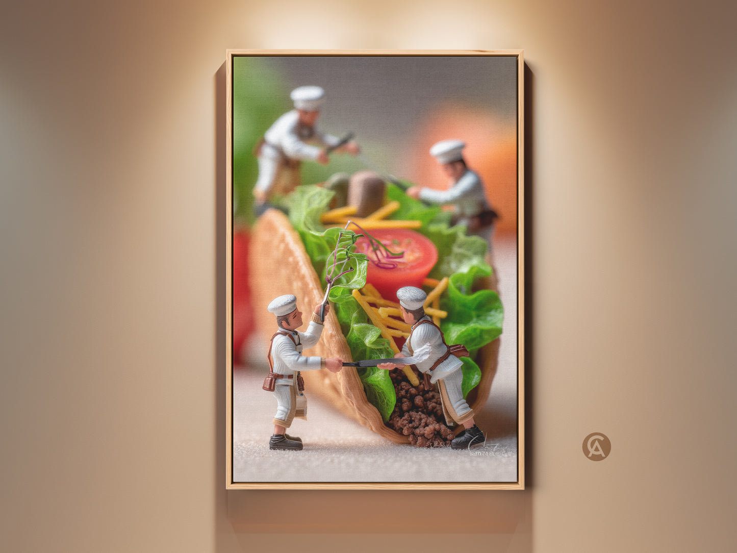 Framed artwork of miniature chefs preparing a taco. The art style blends realism with a whimsical concept. It adds a unique touch to kitchen or dining room decor. Purchase this framed piece for a conversation-starting art.