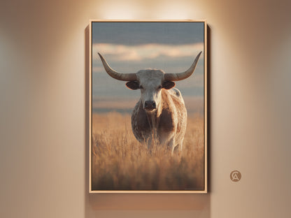 Rustic longhorn cattle canvas artwork in a farmhouse style. The animal print features goldenrod and beige hues evoking a Tuscan landscape. This photorealistic wildlife art enhances any country living room or western ranch decor.