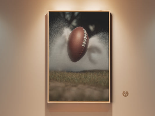 Elevate your space with this dynamic football art print. It captures the raw energy of sports action. This canvas wall decor is perfect for a modern office or man cave. A great gift for any sports lover it features a textured football against a misty field bringing an athletic touch to any room.
