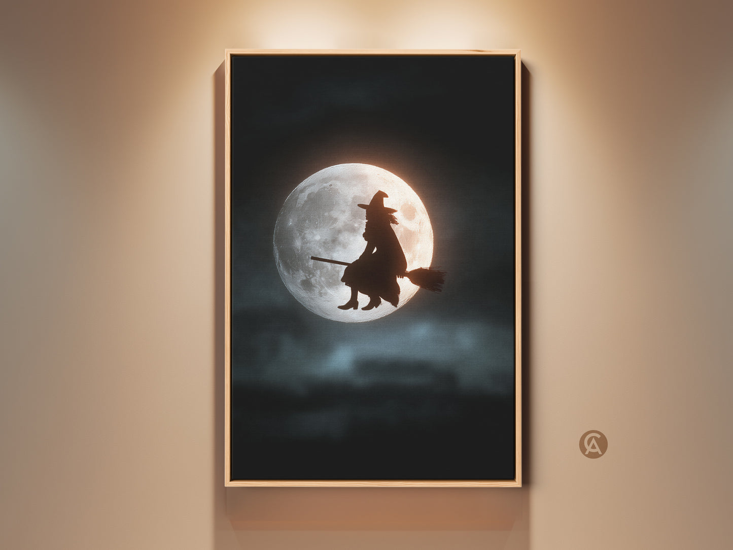 Framed witch silhouette art print on a wall. The dark blue black artwork shows a witch flying on a broom against a luminous moon. This eclectic Halloween wall decor adds mystical charm to any room. Perfect for Halloween enthusiasts and thematic home decor.