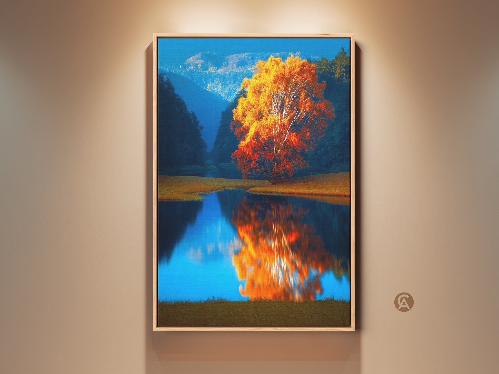 Autumn Tree Lake Canvas Print framed in a room setting. Impressionistic landscape art capturing orange yellow hues reflecting on blue lake water. Boho style wall decor for a cozy nature-inspired home art. This landscape art brings the beauty of fall indoors.
