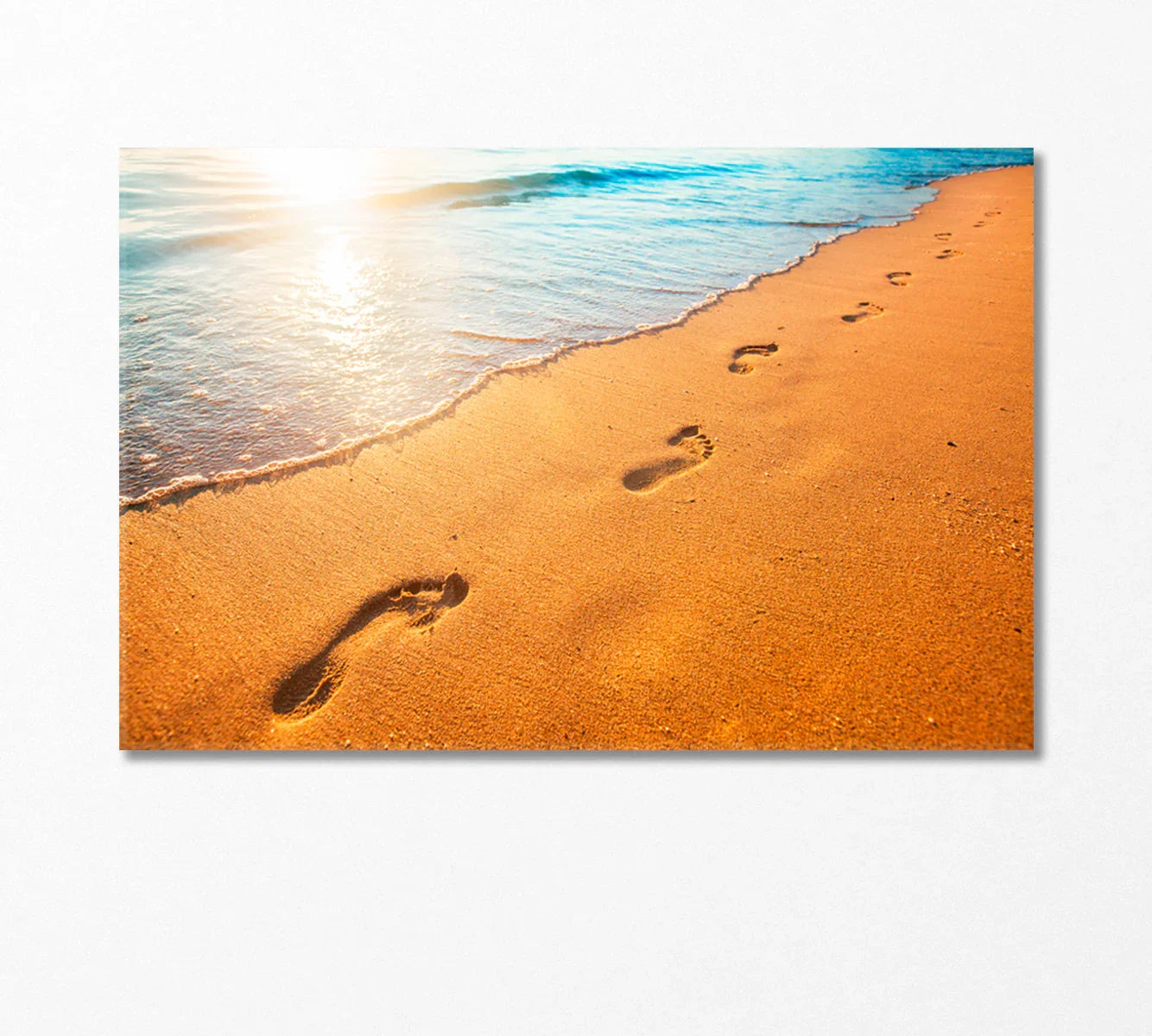 Golden footprints along a sunlit shoreline—warm, welcoming mood for reception areas.