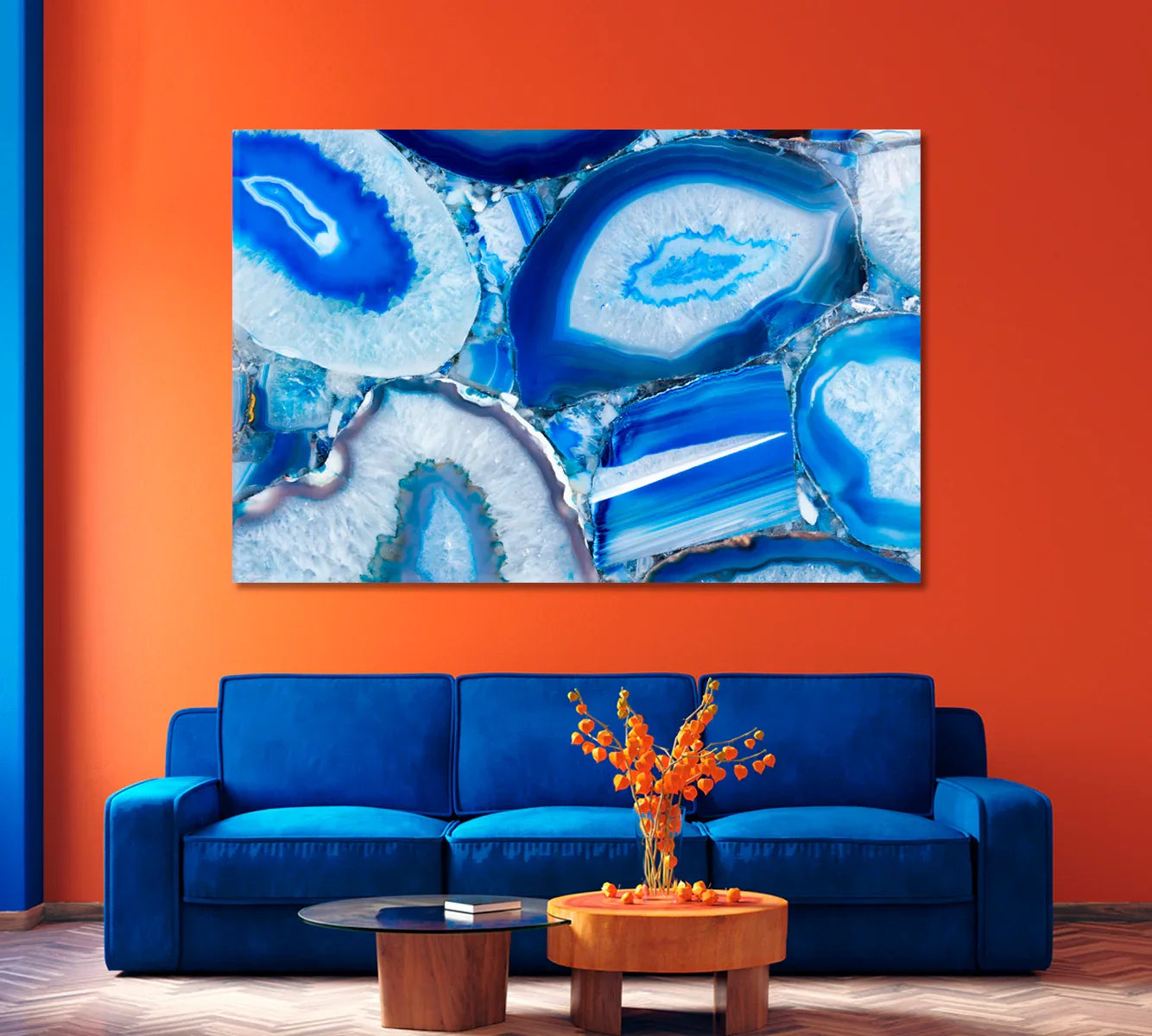 Abstract Blue Agate canvas styled over a cobalt sofa against warm terracotta wall — bold contrast look