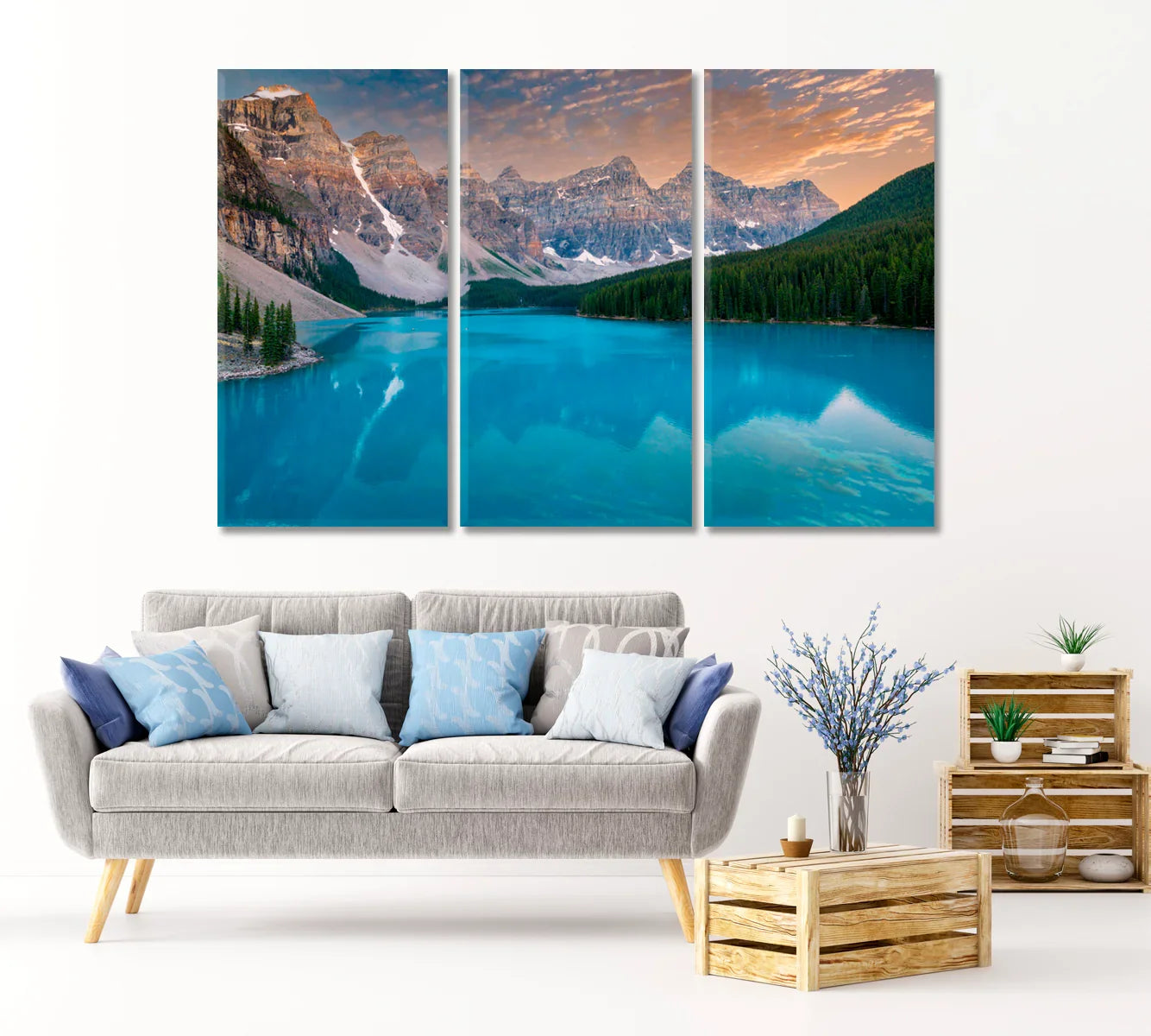 Triptych (3-panel) configuration of Moraine Lake canvas print above a sofa