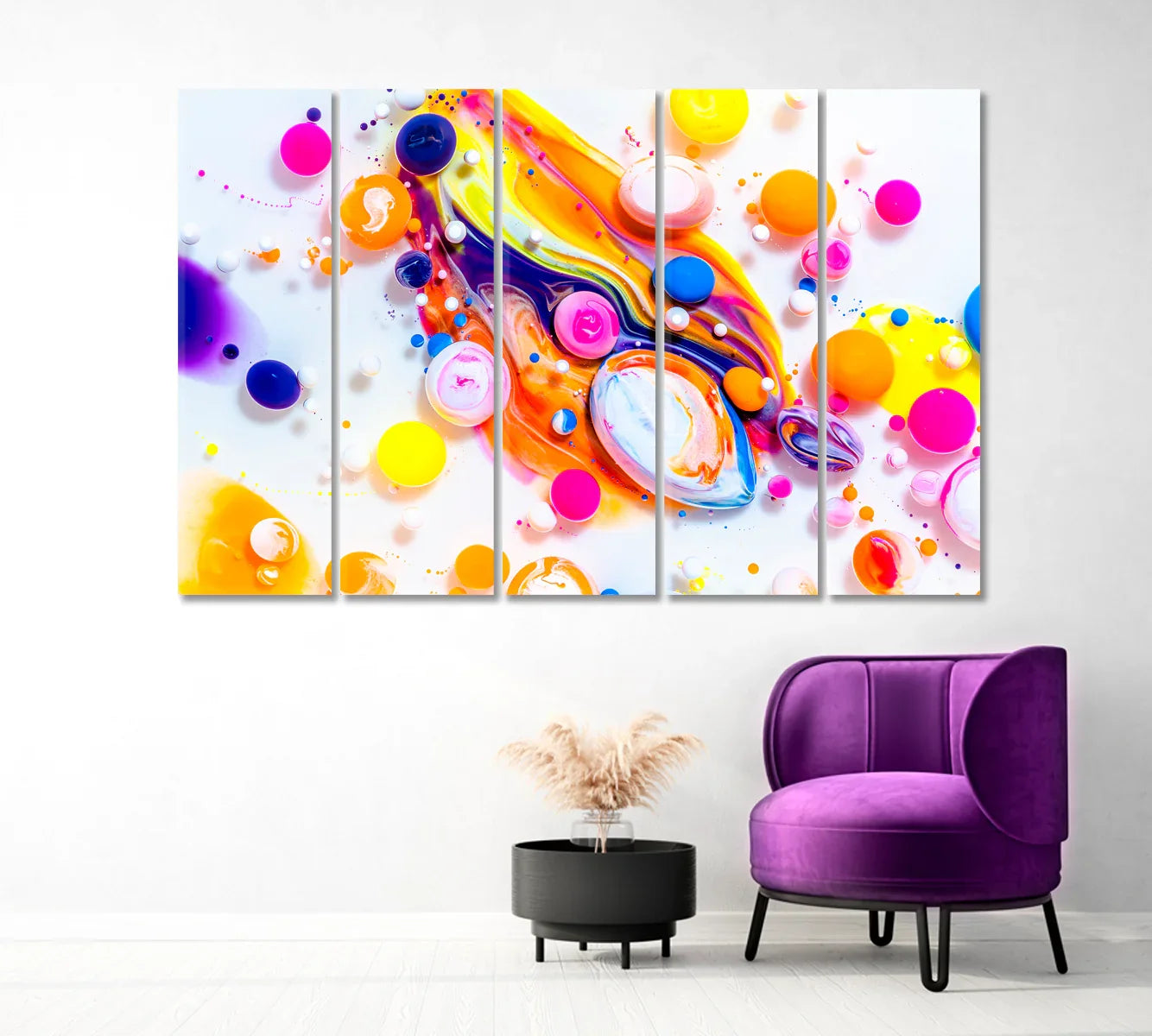 Rainbow bubbles artwork staged as a multi-panel canvas above a purple lounge chair