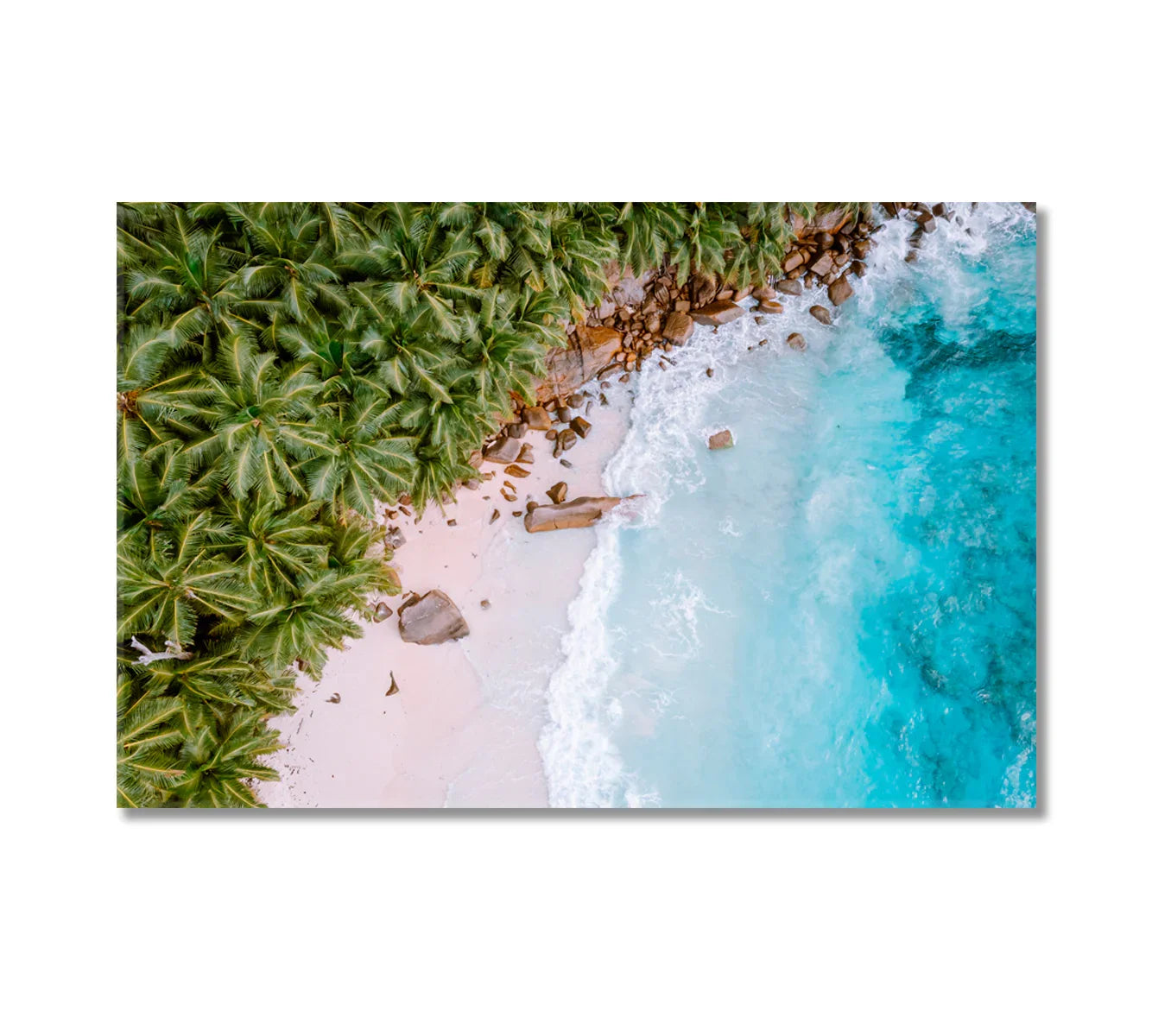 Seychelles tropical island coastline canvas print — aerial view of turquoise ocean meeting pink-tinted sand and lush palms