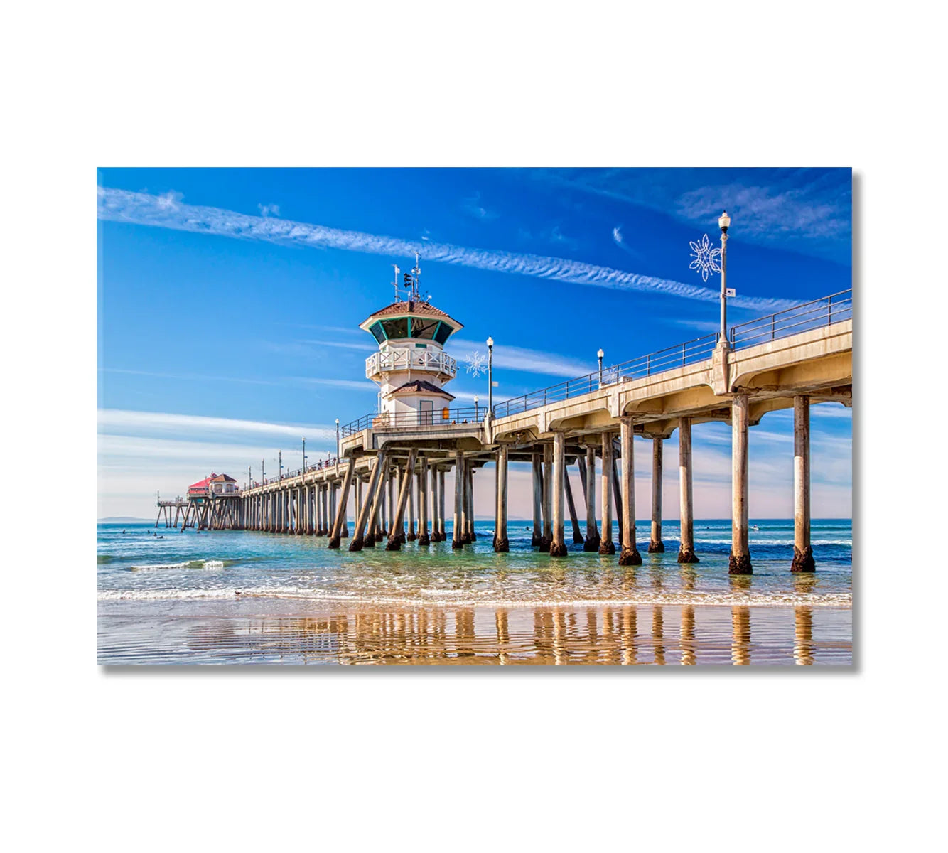 Huntington Beach Pier under a bright blue sky — strong lines and reflections create a modern coastal statement.