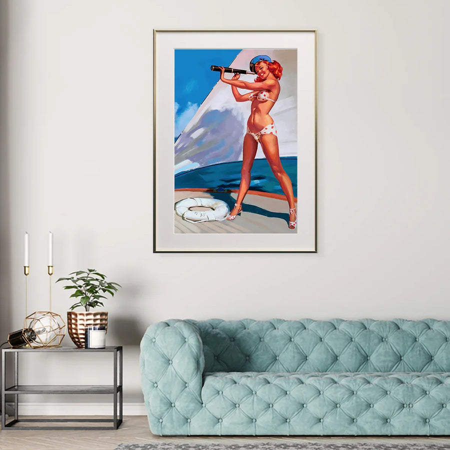 Retro sailor girl illustration poster styled above a teal tufted sofa