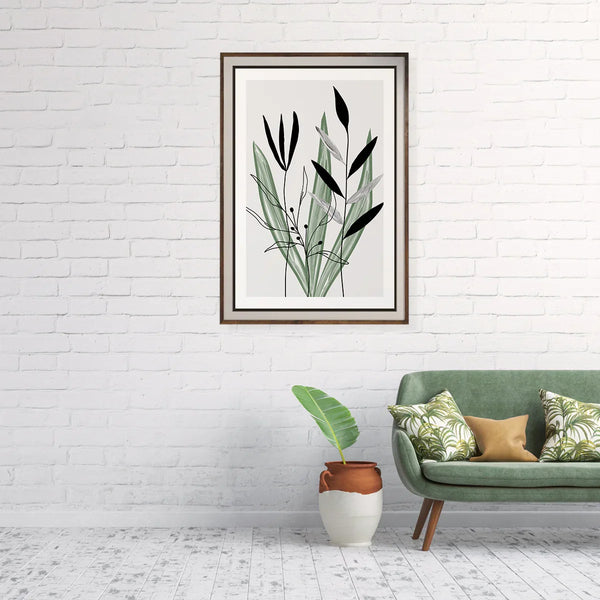 Minimalist leaves poster above green sofa